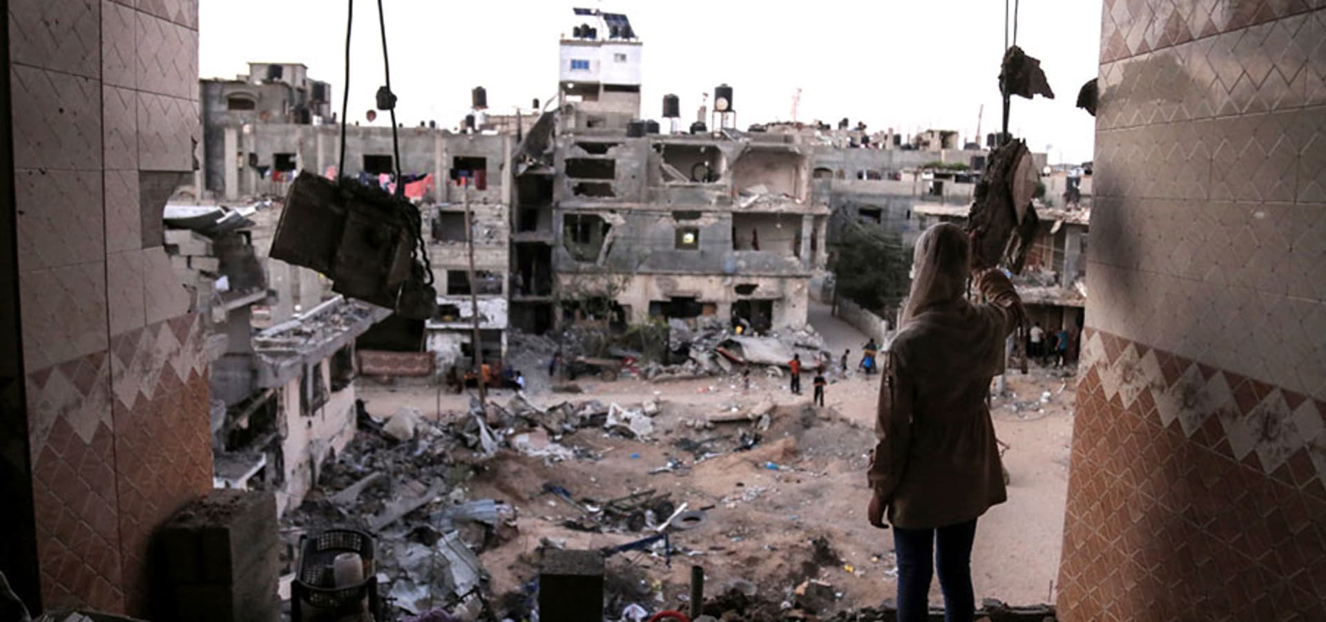 Girl in a destroyed building in Gaza