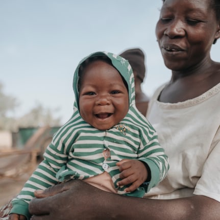 Burkina Ieda- Une femme et son enfant